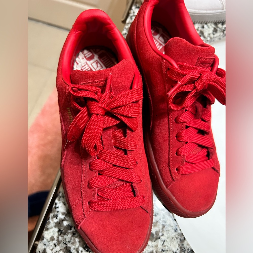 Red puma sneakers